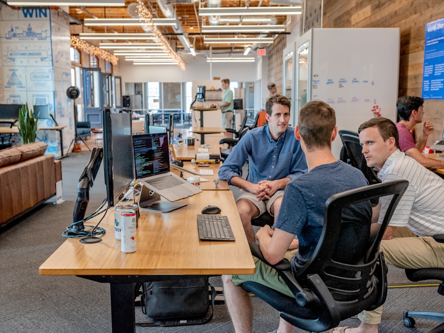 Team meeting with laptops in a conference room
